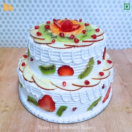 Order this 2 Tier Fruit Cake Online and the get same day cake delivery in Noida, Ghaziabad, Vaishali, Vasundhara, Gaur city, Noida Extension and Delhi. Visit bakeneto.com and checkout all types of theme cakes online.