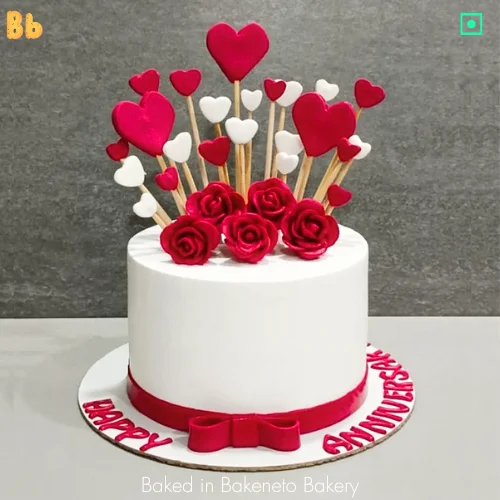 Rose And Heart Cake is the premium fondant customized cake for Anniversary or wife's birthday or cake to express love. Order customized cakes online by Bakeneto in Noida, Indirapuram, Ghaziabad, Vasundhara, Vaishali and Noida Extension.