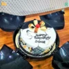 Order fresh white marble bomb cake on birthday of your loved ones and send them cake surprise by bakeneto.com