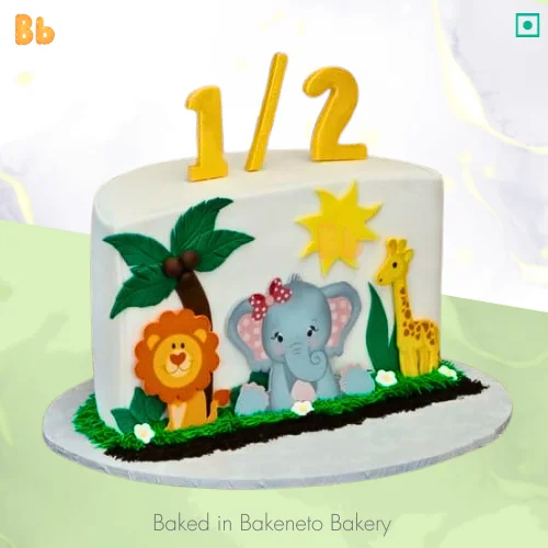 Half Jungle Cake is the best customized cake design to celebrate a half year birthday of your kid. Get same-day cake home delivery near Noida, Delhi, Gurugram, Ghaziabad, Greater Noida Extension.