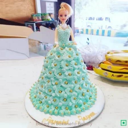 Order Green Doll Cake online and get cake delivery in Noida, Ghaziabad and Greater Noida Extension.