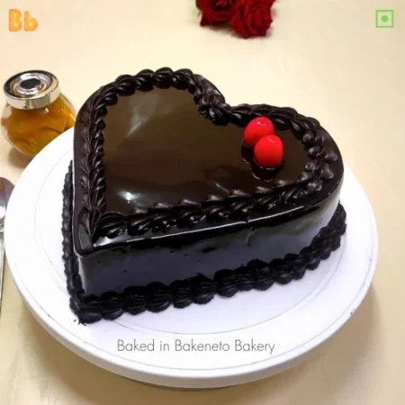 Fresh Heart Shape Truffle Cake is available for home delivery in Noida, Ghaziabad, Noida extension by the best cake shop nearby. Best Cake shop, bakeneto.com