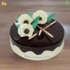 Order fresh Black Treat Cake for birthday celebration. Cake delivery in just 60 minutes in Noida, Indirapuram, Gaur City | 10% Off | 100% Eggless Cakes.