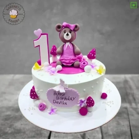 Order fresh and delicious 1st Year Teddy Cake for your kid's birthday online. Get fast online Cake delivery in Noida, Ghaziabad and Noida Extension by best cake shop, Bakeneto.