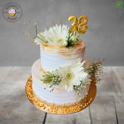 Order fresh and delicious 38th Birthday Cake for loved ones online. Get fast online Cake delivery in Noida, Ghaziabad and Noida Extension by best cake shop, Bakeneto.