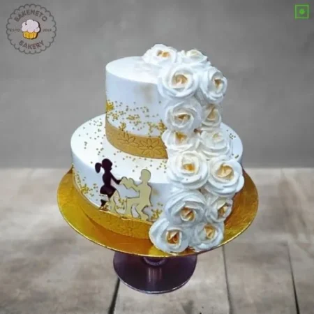 Order fresh and delicious White Couple Cake for your special Anniversary Engagement or wedding online. Get fast online Cake delivery in Noida, Ghaziabad and Noida Extension by best cake shop, Bakeneto.