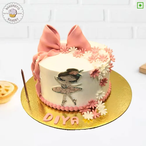 Bow and Doll Cake delivery in Noida, Ghaziabad, Noida Extension and Ashok Nagar Delhi. Bakeneto is most trusted for making customized birthday cakes, Customized wedding cakes, engagement cakes and Anniversary cakes.