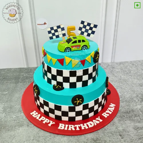 Order 2 Tier Car Rally Cake for kid's birthday in 30 minutes in Noida. Super fastcake delivery nearby in Noida, Ghaziabad, Noida Extension. Get customized theme cakes in 2 hours in Noida.