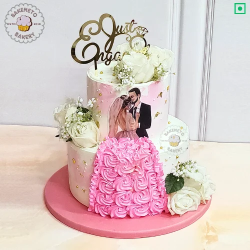 Order fresh and delicious Just Engaged 4 Kg Cake on your Engagement Day Online. Get various types of customized cakes in just 2 to 3 hours on the same day. Get 25+ flavors and get free cake delivery in Noida, Ghaziabad, Indirapuram, Vaishali, Vasundhara, Kaushambi and Noida Extension, Gaur City, Eco Village etc.