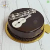 Guitar Truffle Cake is the simple sober cake for brother's birthday. Vibrant, delicious and fresh cake online by bakeneto in Noida, Ghaziabad and Noida extension