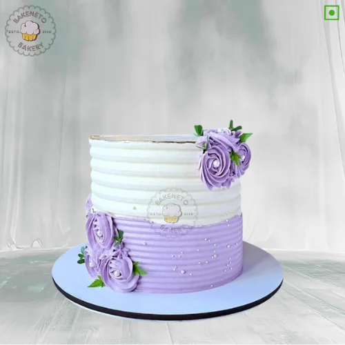 Order yummy, fresh and eggless Purple Floral Cake Online by best Cake Shop delivers in Noida, Ghaziabad, Noida Extension and nearby area.