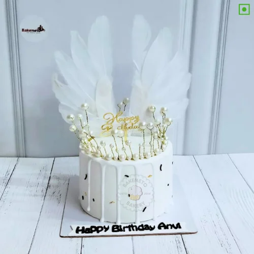 Order yummy, fresh and eggless White Angel Cake Online by best Cake Shop delivers in Noida, Ghaziabad, Noida Extension and nearby area.